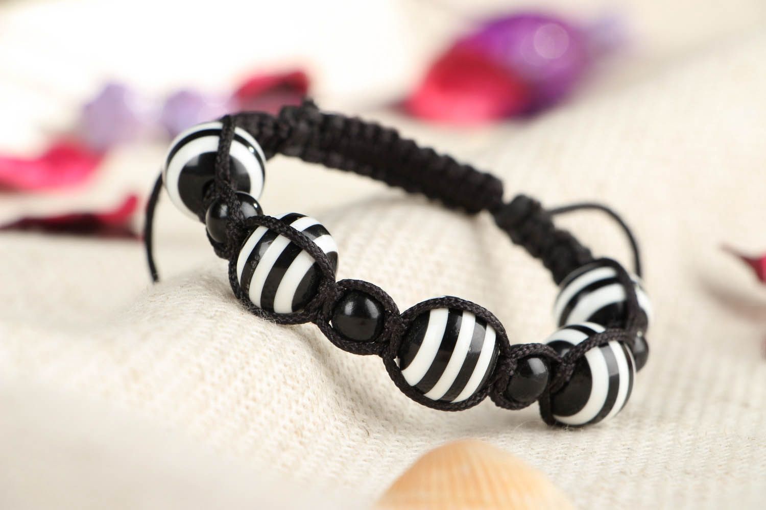 Black and white braided bracelet with beads photo 2