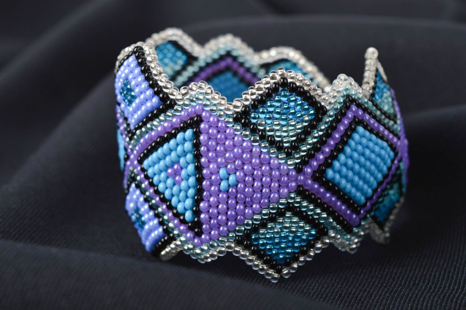 Art stylish beaded handmade bracelet in blue and purple colors for women photo 1