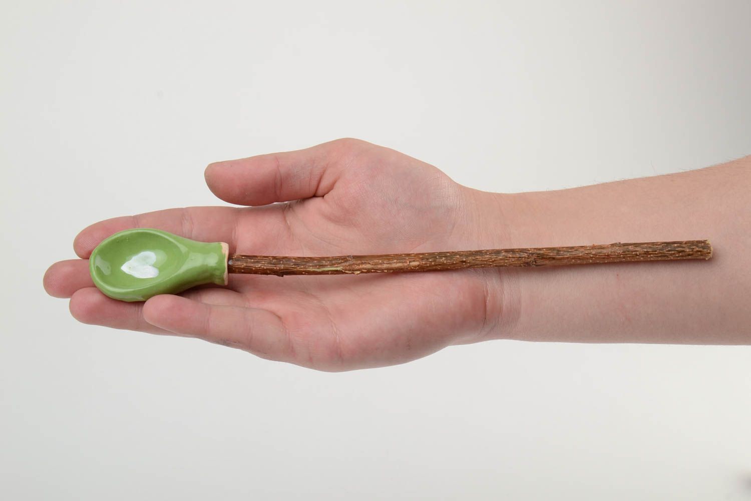 Glazed green handmade designer clay spoon with apricot branch handle photo 5