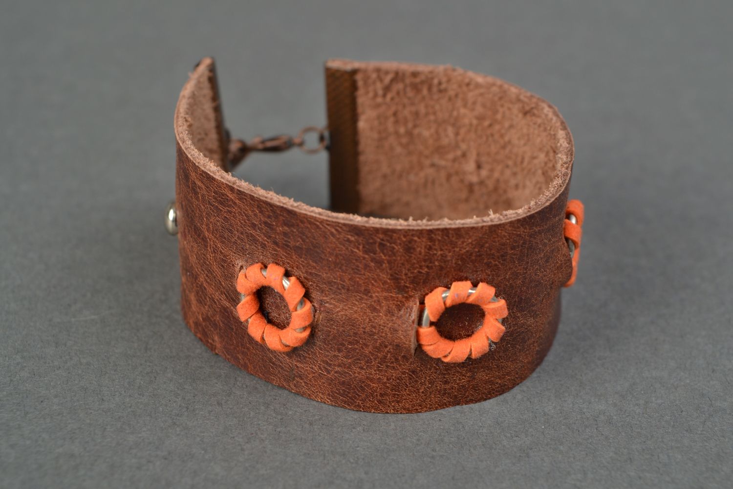 Brown genuine leather bracelet with metal inserts  photo 3