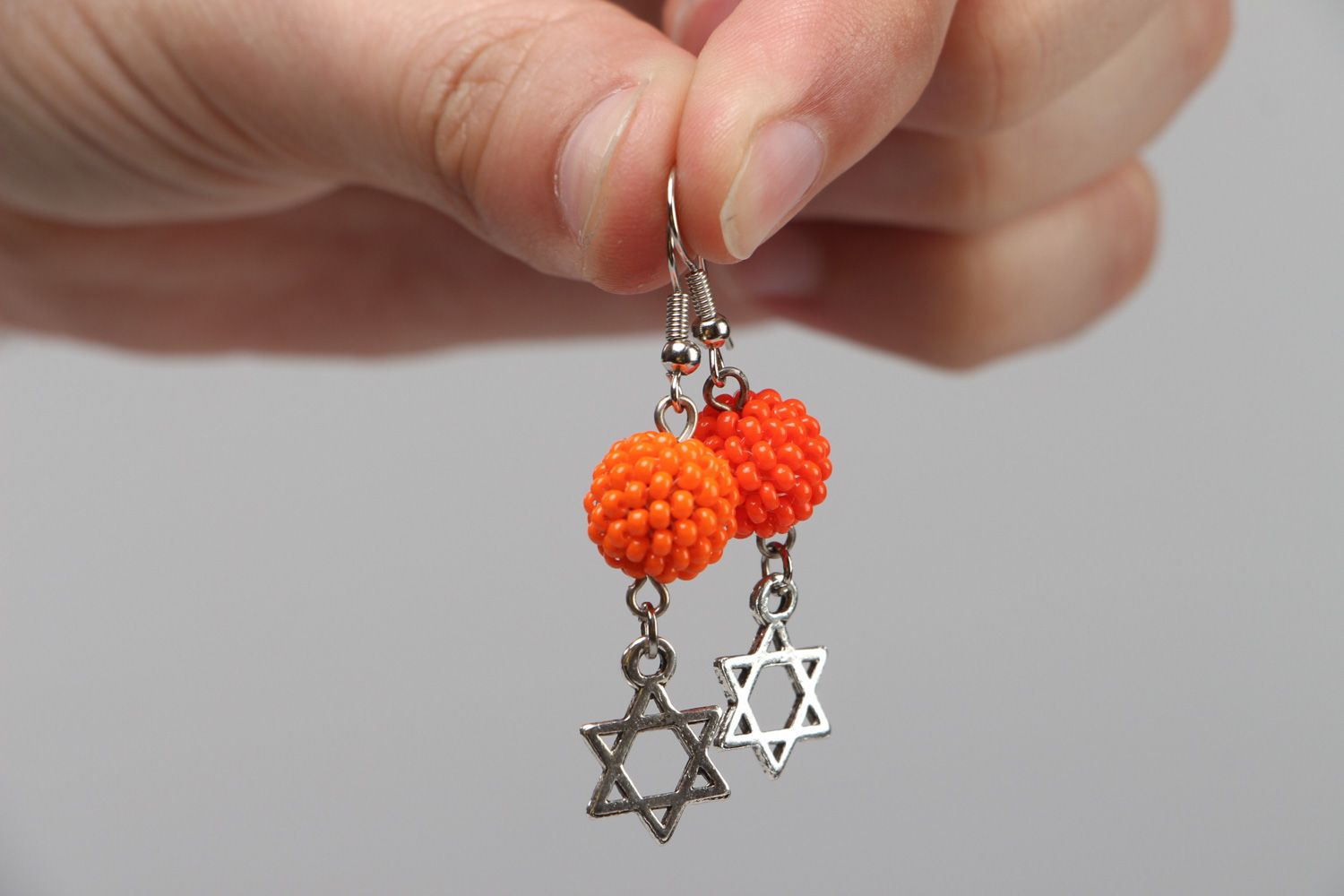 Handmade orange beaded dangle earrings with metal charms Star of Judah  photo 3