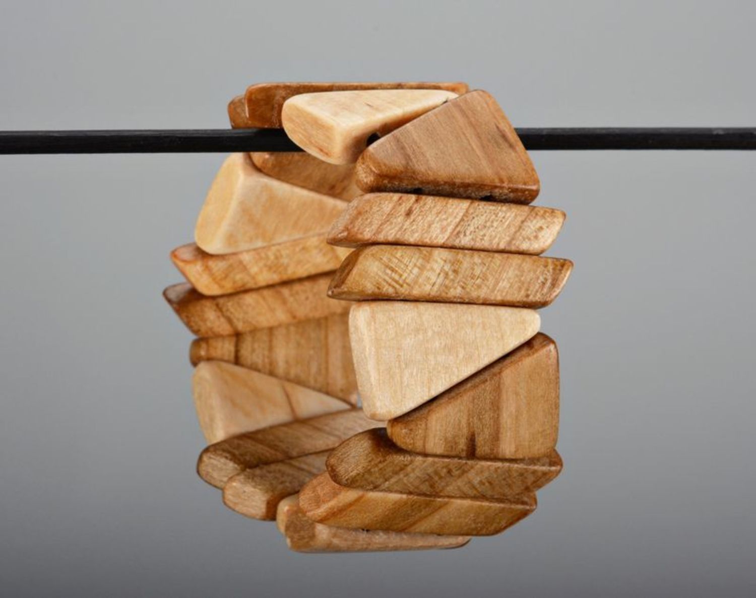 Beige bracelet made from walnut wood Asymmetry photo 3