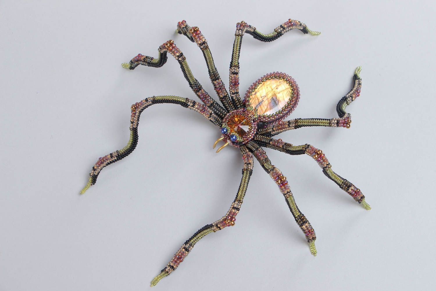 Handmade beaded spider figurine woven of beads with labradorite stone table decor photo 2