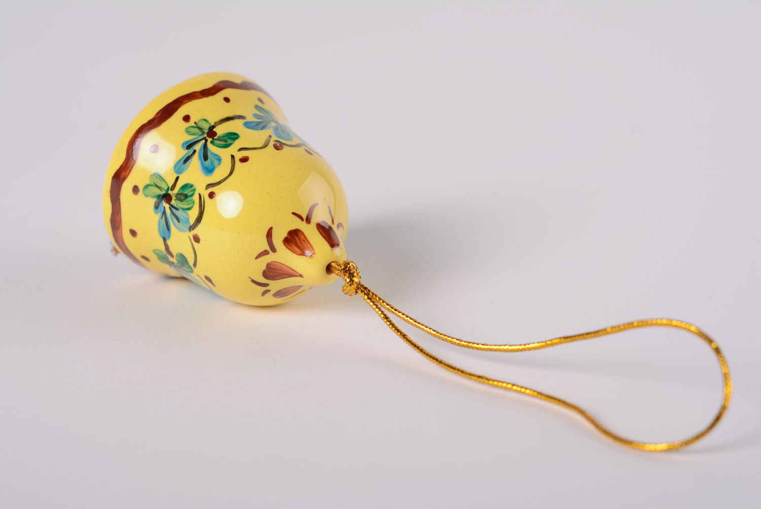 Handmade decorative yellow maiolica ceramic hanging bell painted with glaze photo 5