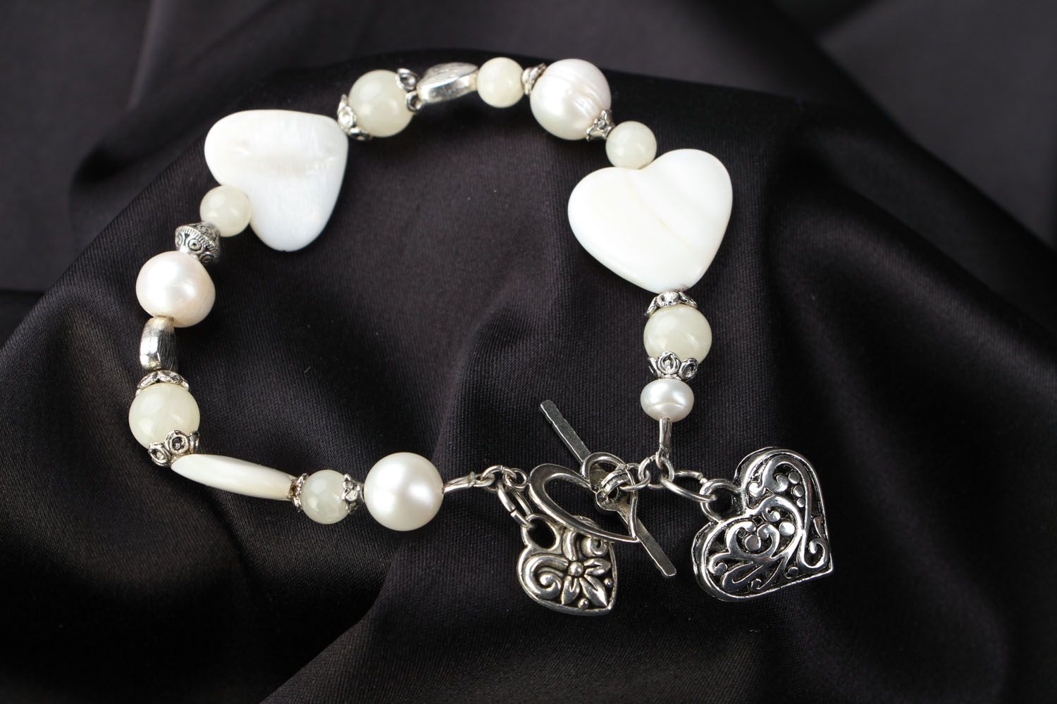 Nacre bracelet with charms photo 1