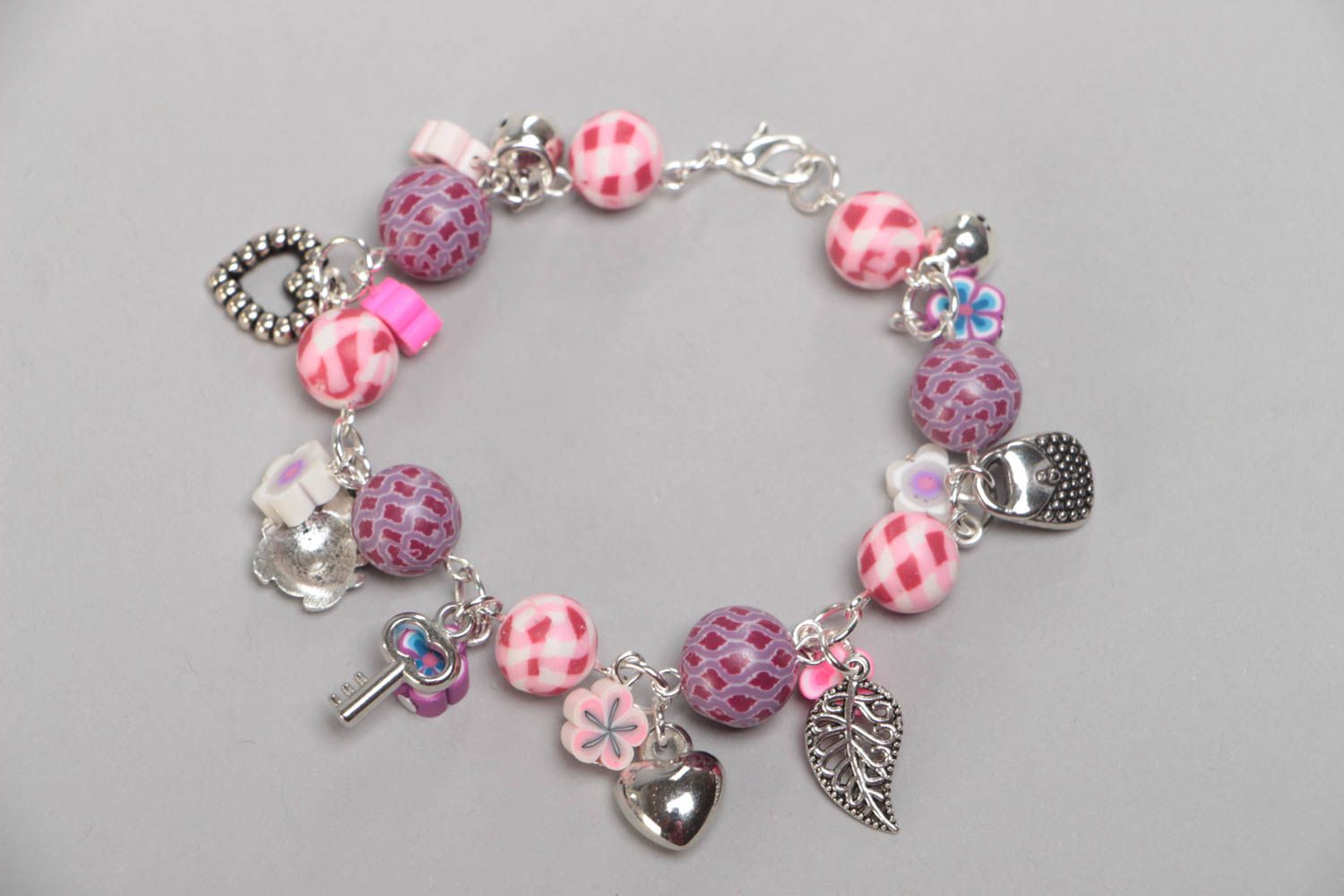 Handmade pink children's polymer clay wrist bracelet with charms photo 4