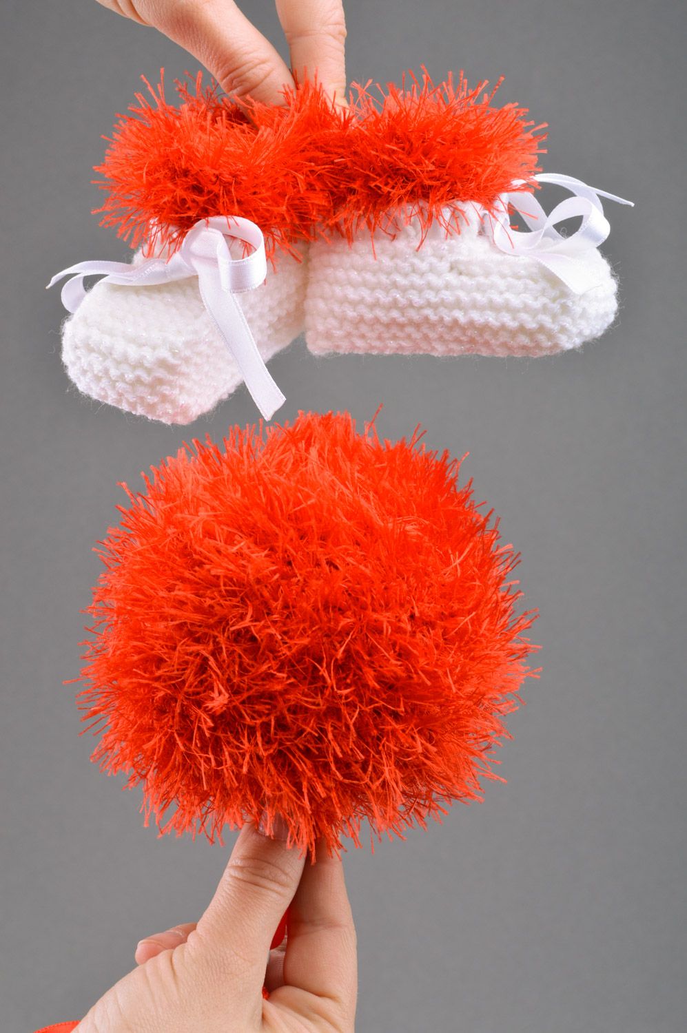 Handmade crochet soft toy ball and knitted baby booties in red and white colors photo 3