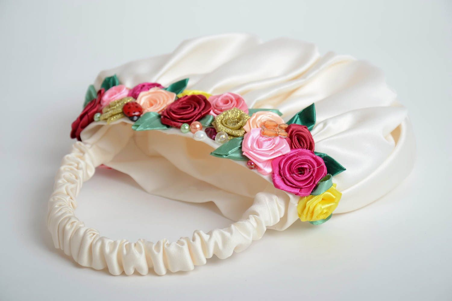 Beautiful white handmade fabric women's bag with satin ribbon flowers  photo 2