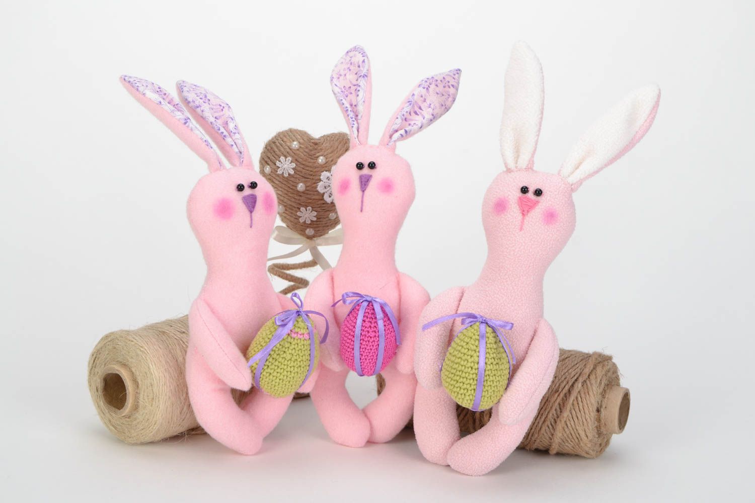Set of handmade fabric toys Bunnies 3 pieces beautiful pink fleece toys with eggs photo 1
