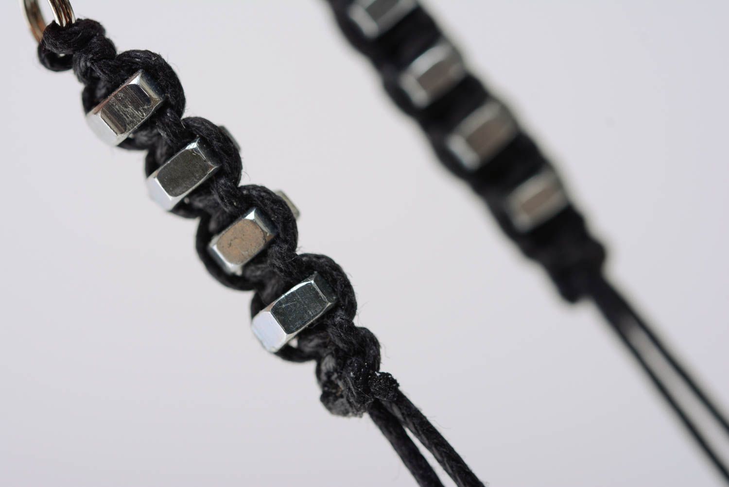 Handmade black designer macrame woven cord earrings with metal nuts photo 4