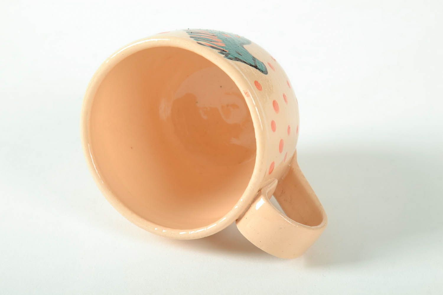 Ceramic tea cup in beige color with handle and bird pattern for kids photo 2