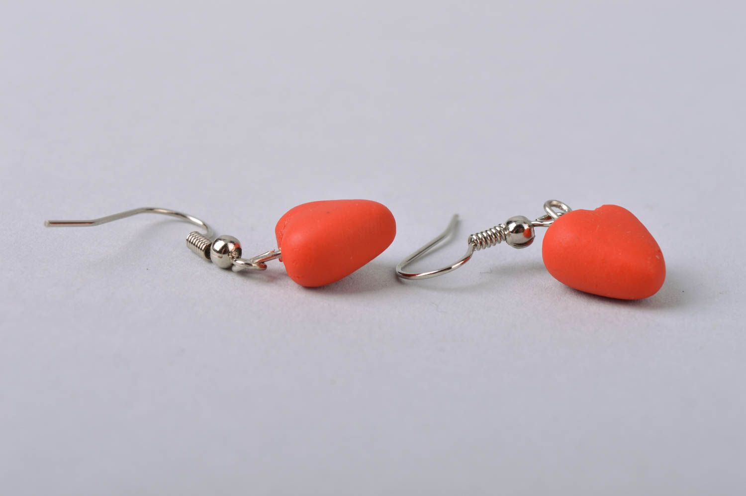Handmade laconic romantic dangle earrings with small cold porcelain red hearts photo 5