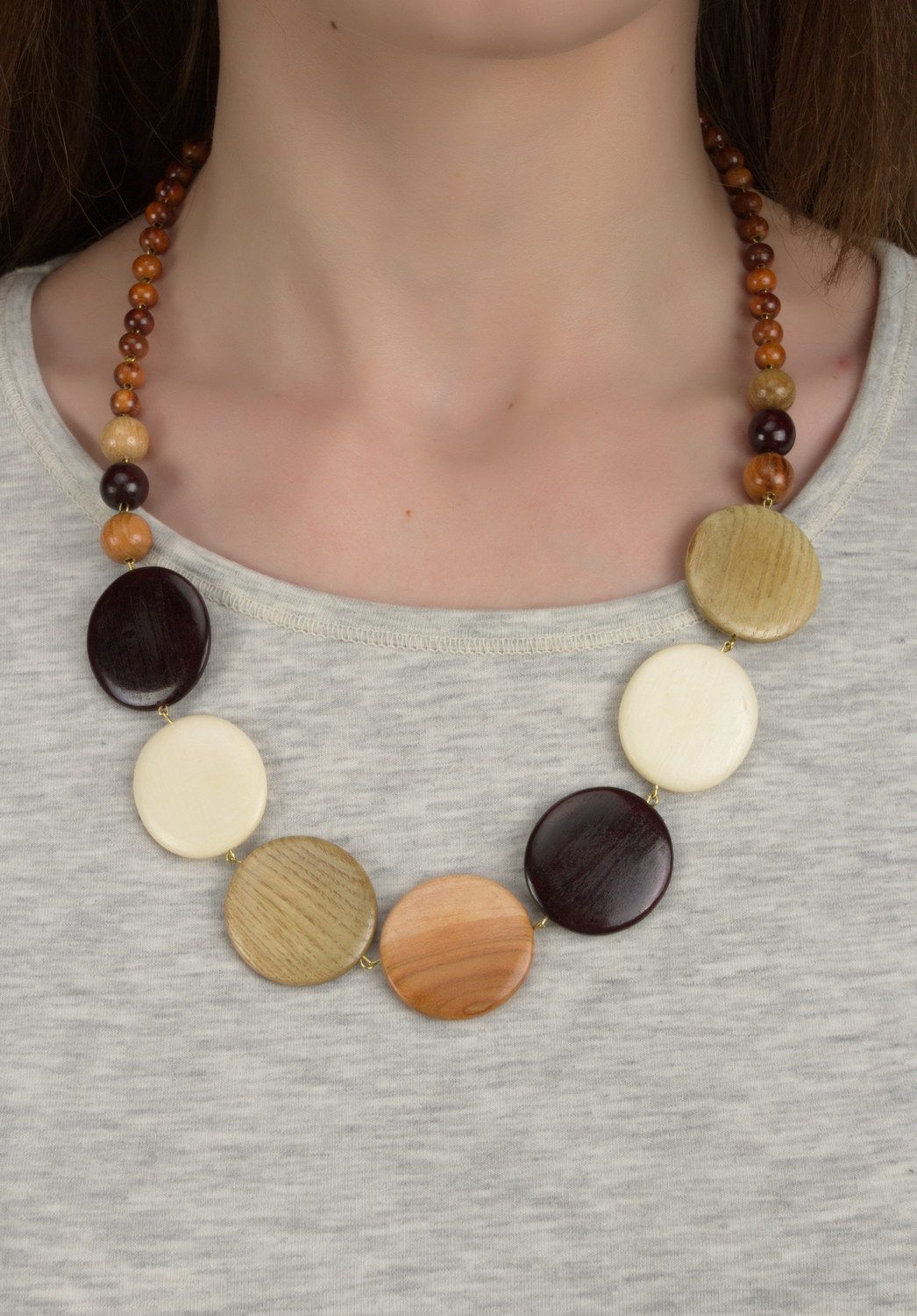 Necklace made of different kinds of wood with a clasp photo 4