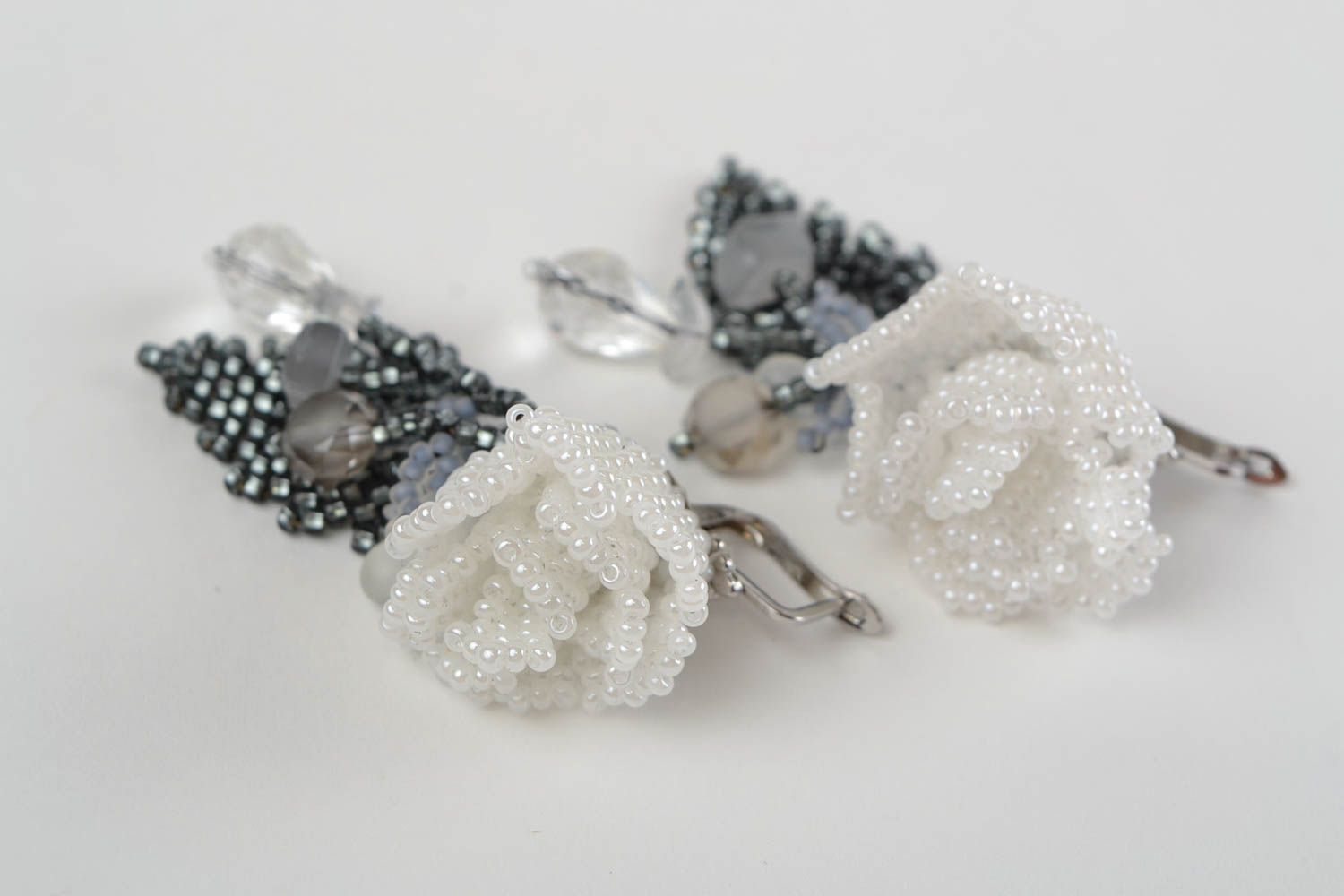 Beautiful handmade designer woven beaded earrings with white roses photo 3