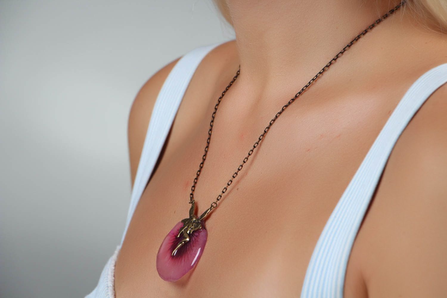Pendant on a long chain with natural flower photo 5