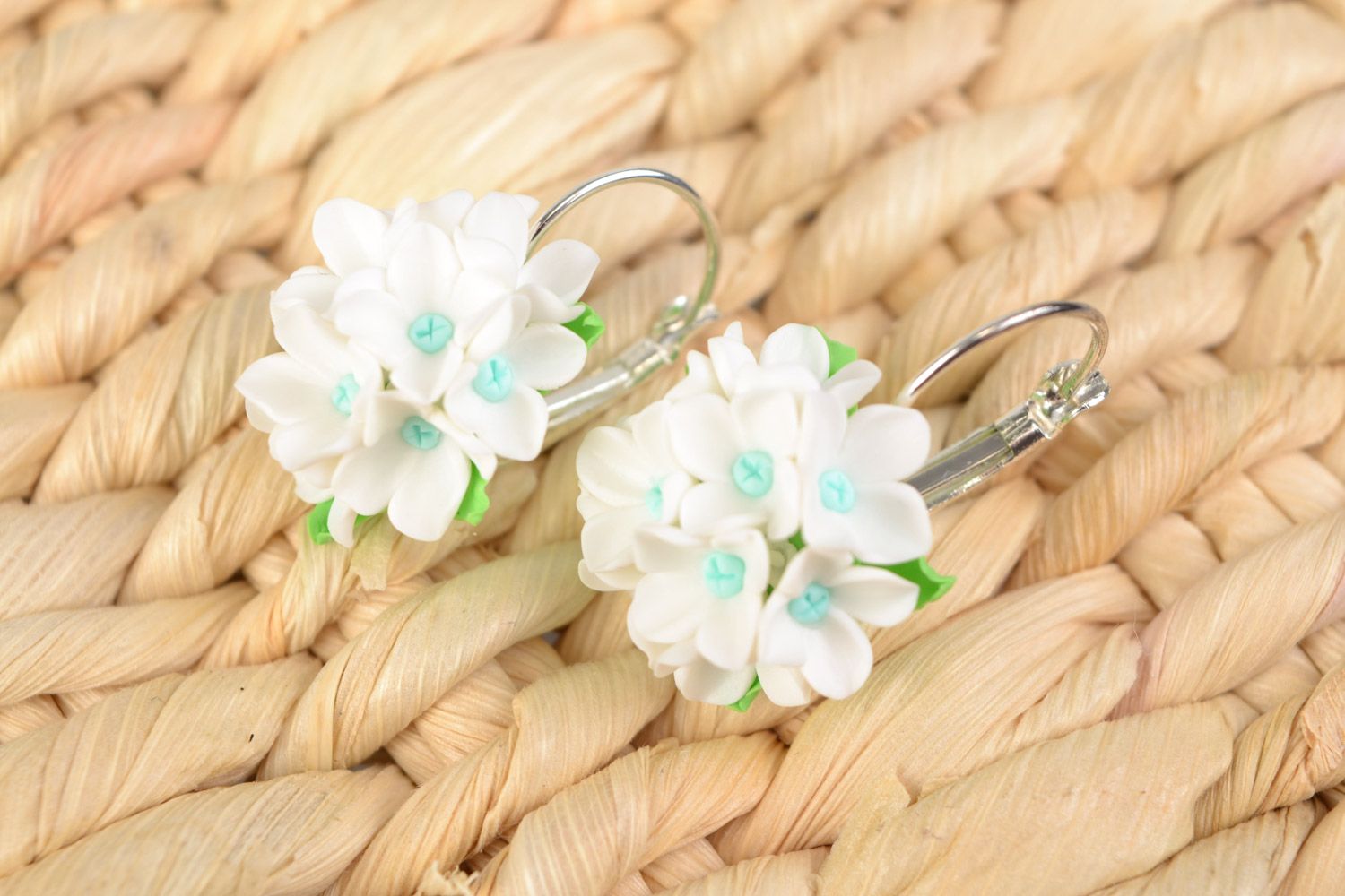 Handmade polymer clay earrings in the shape of bouquets of lilies of the valley photo 1