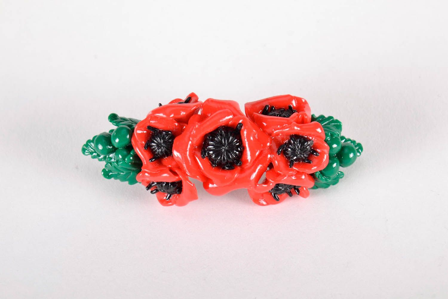 Handgemachte Haarspange mit roten Blumen aus Polymerton foto 3