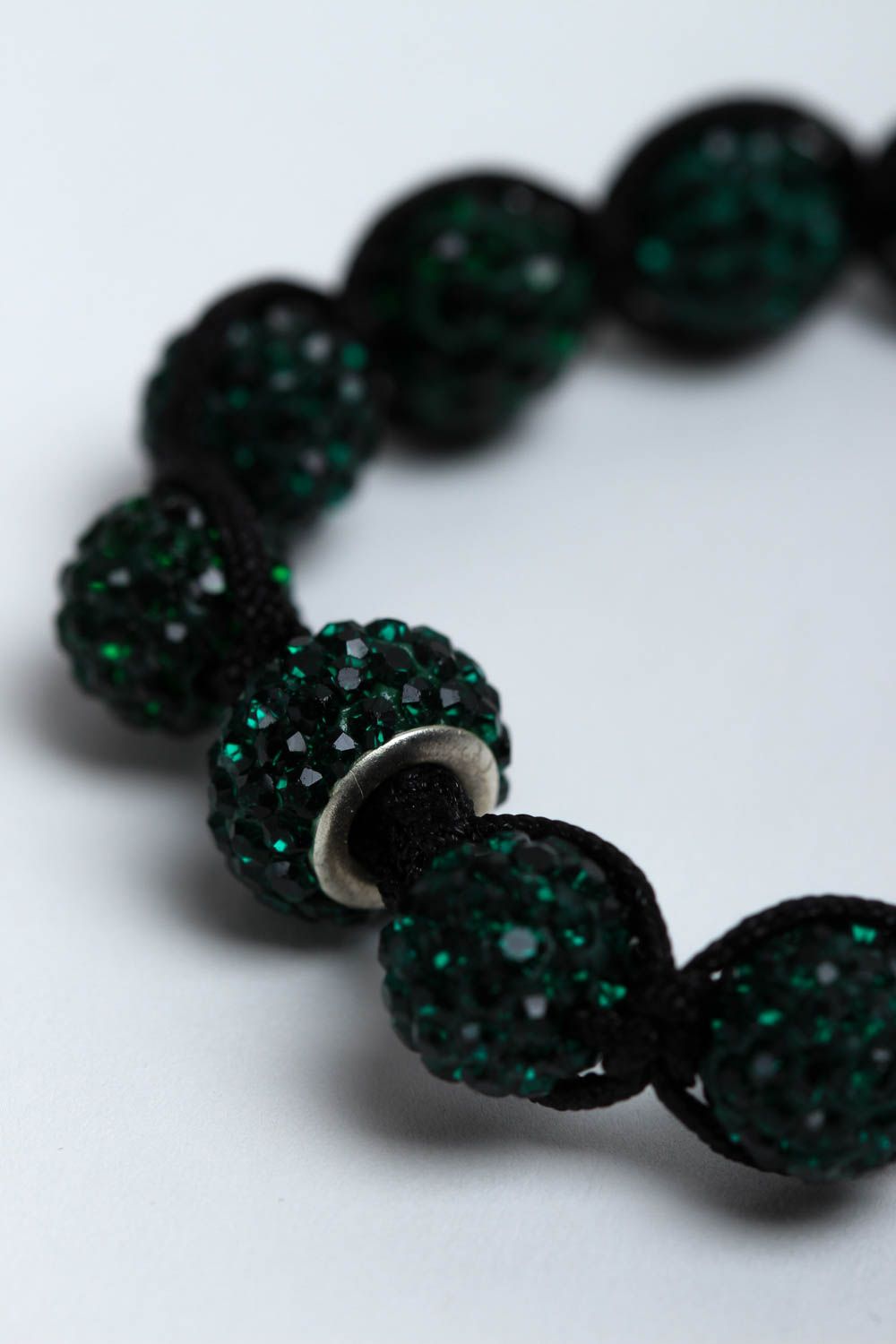 Dark green bead bracelet with strand black cord photo 3