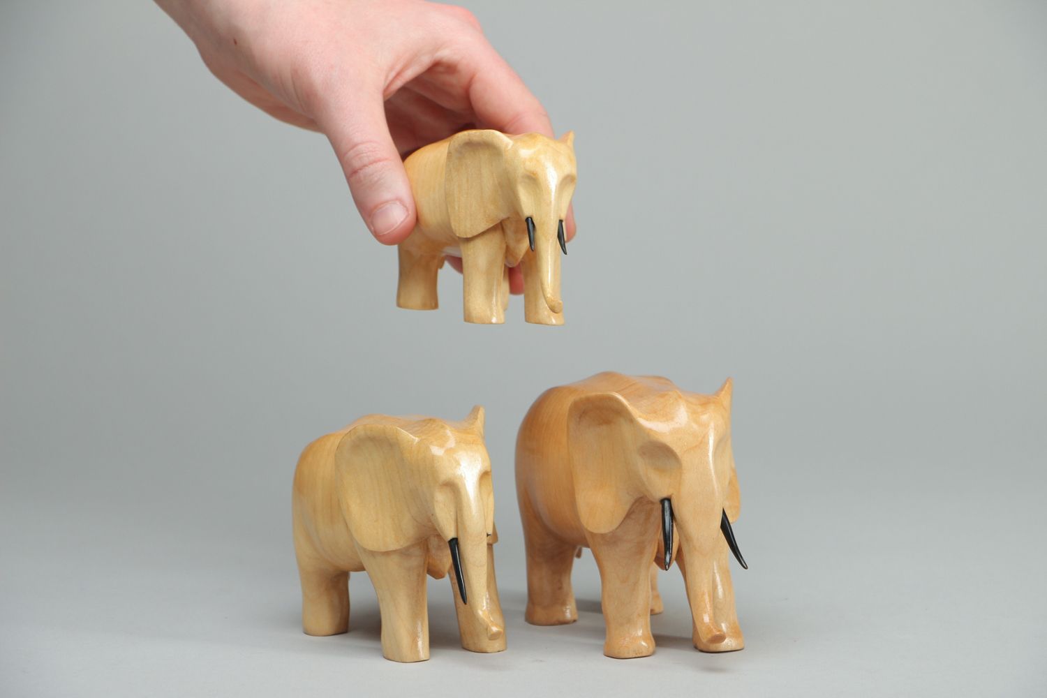 Set of wooden figurines of elephants 3 items photo 4
