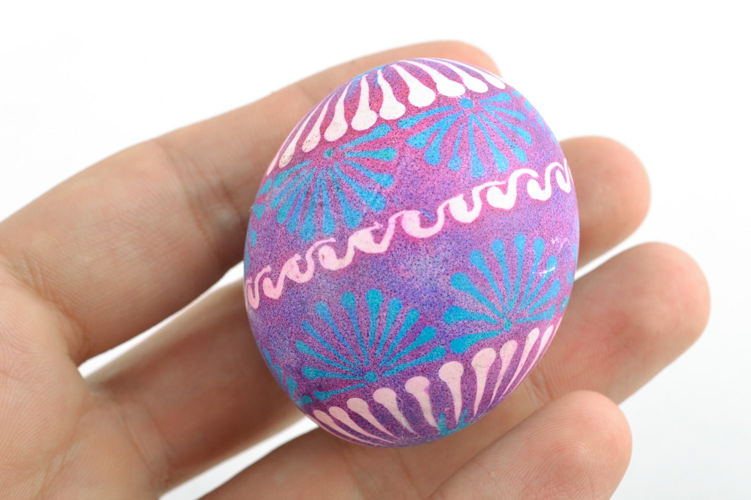 Handmade Easter egg painted with wax in Lemkiv style in blue and violet colors photo 2