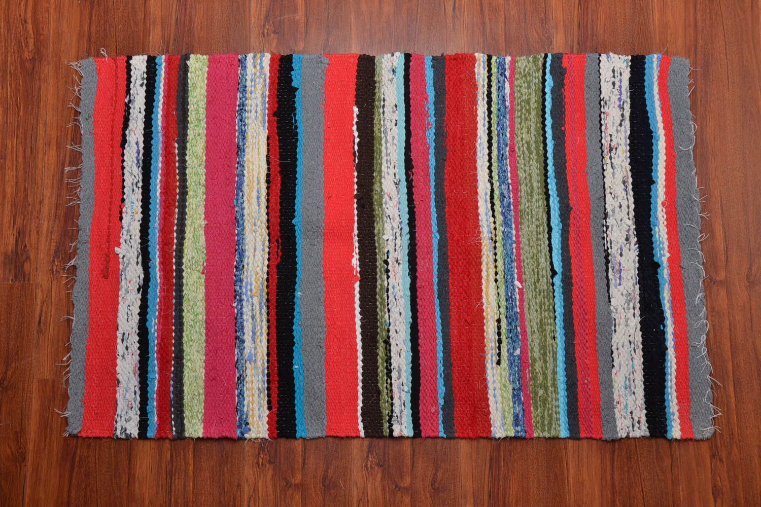 Handmade woven striped rug photo 1