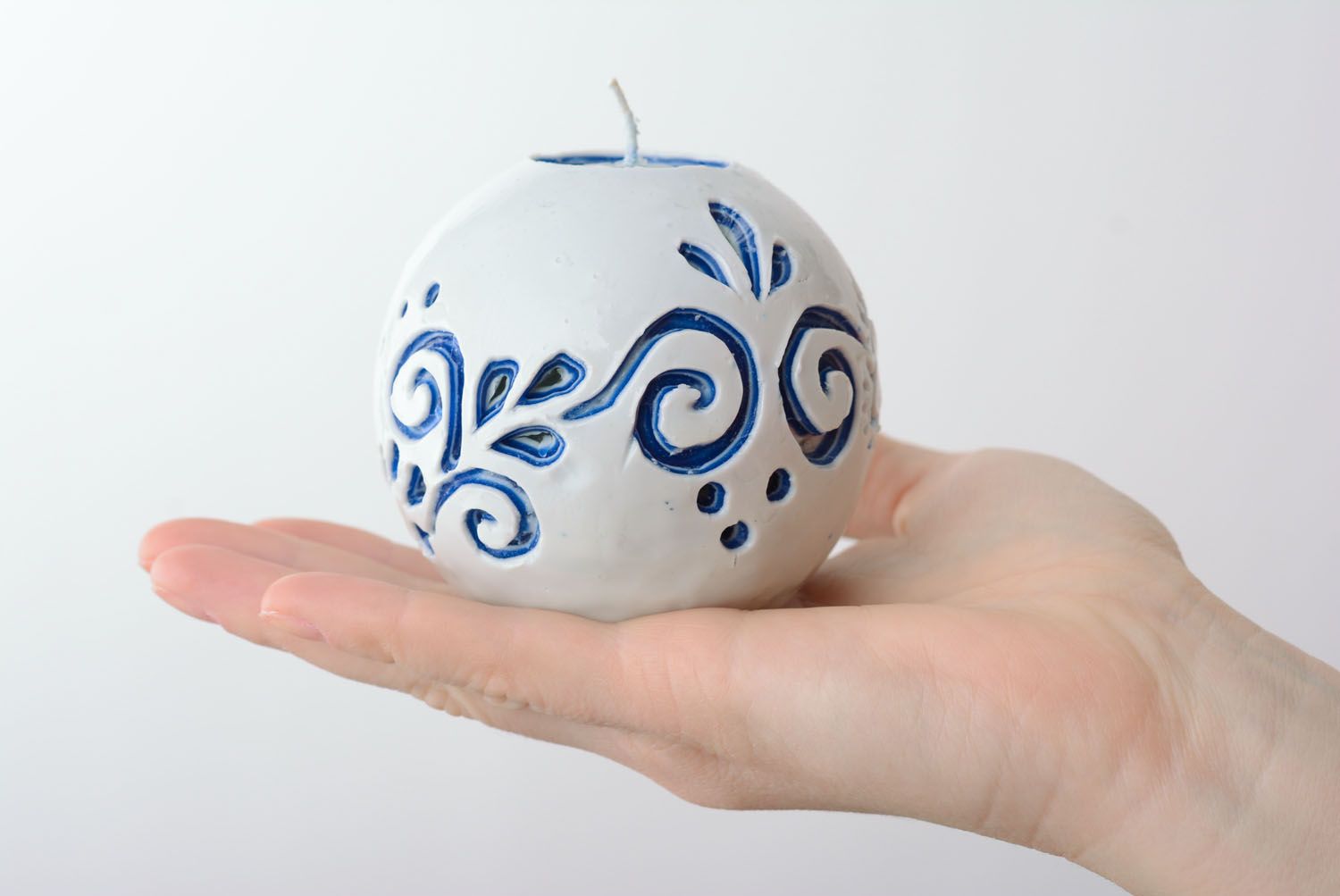 Vela-bola decorativa esculpida artesanal  foto 4