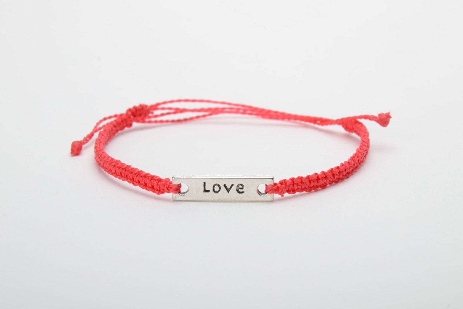 Handmade women's macrame woven bracelet of red color with metal lettering Love photo 4