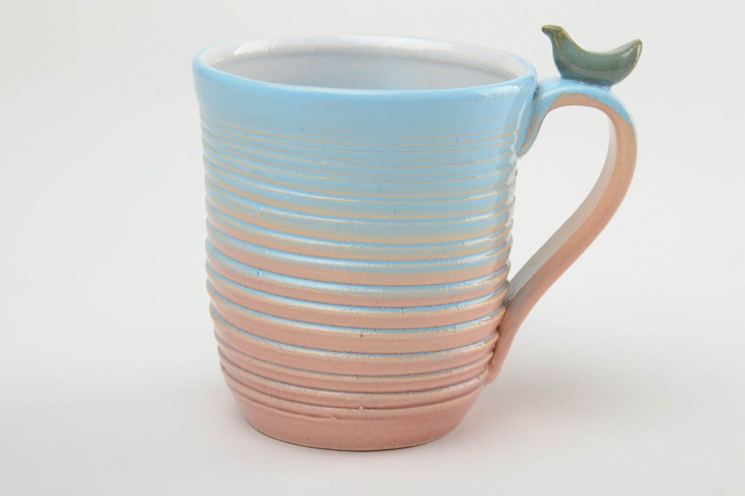 10 oz porcelain handmade drinking cup in blue, white, and beige colors with handle photo 2
