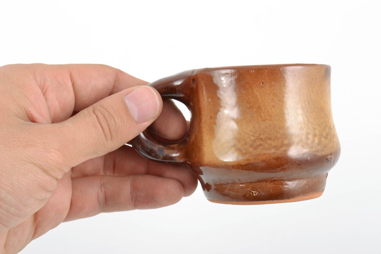 Handmade 5 oz glazed natural clay coffee cup in brown color and white color inside photo 2