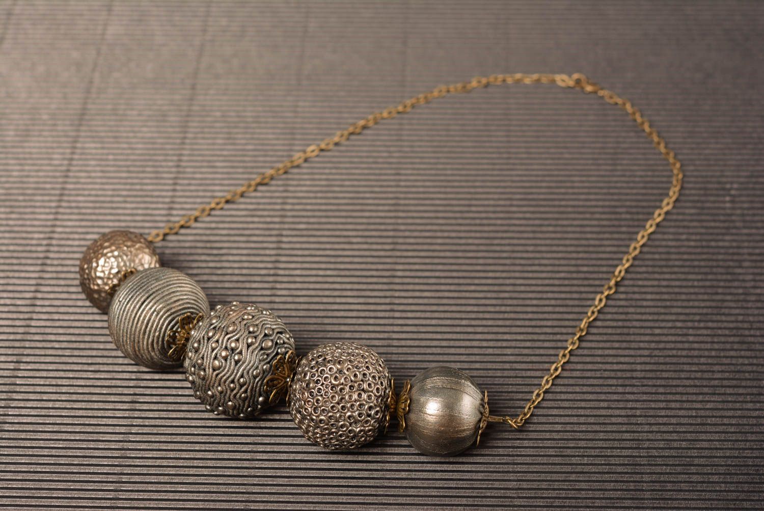 Handmade necklace with polymer clay beads of bronze color on metal chain photo 1