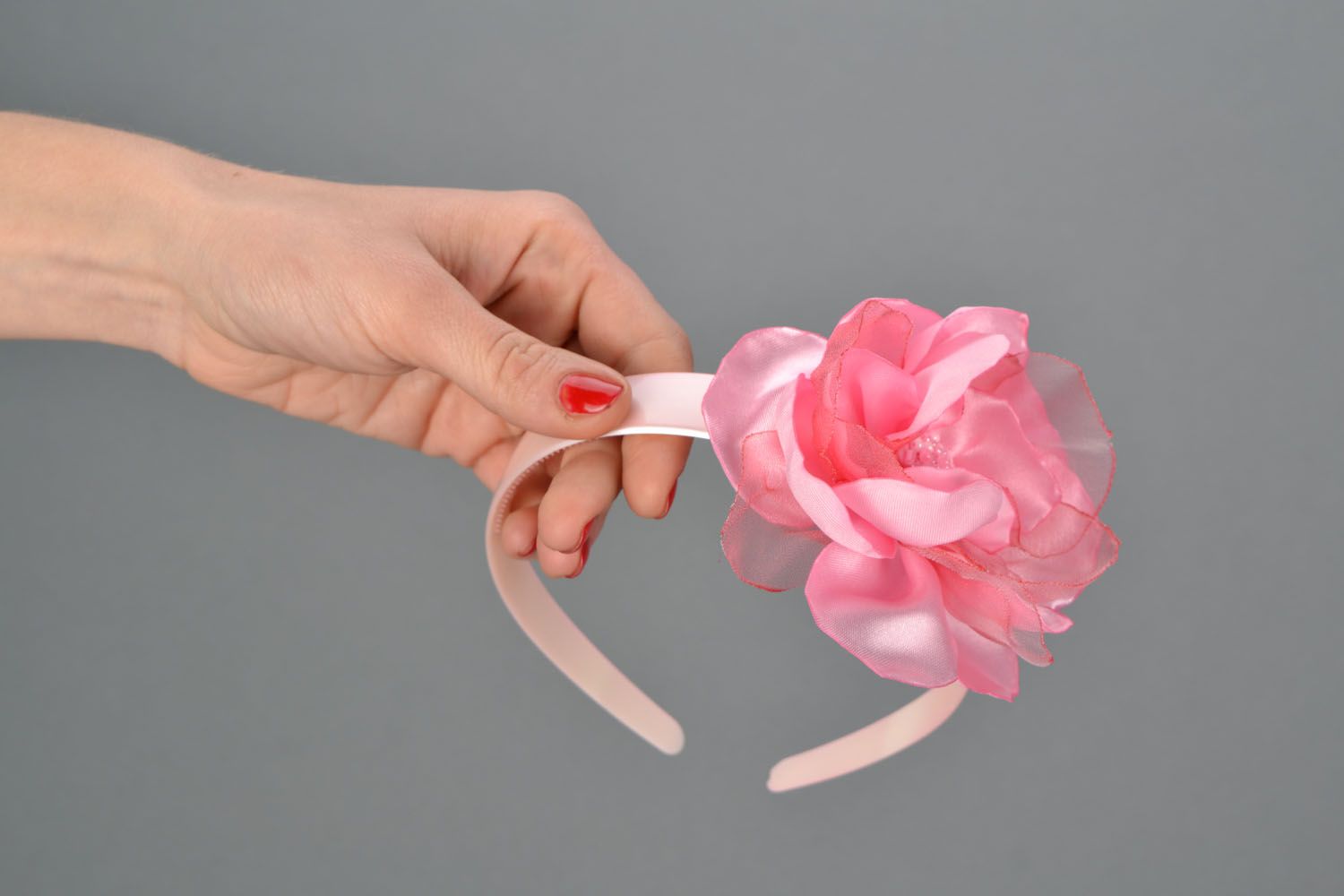 Pink headband with flower photo 2
