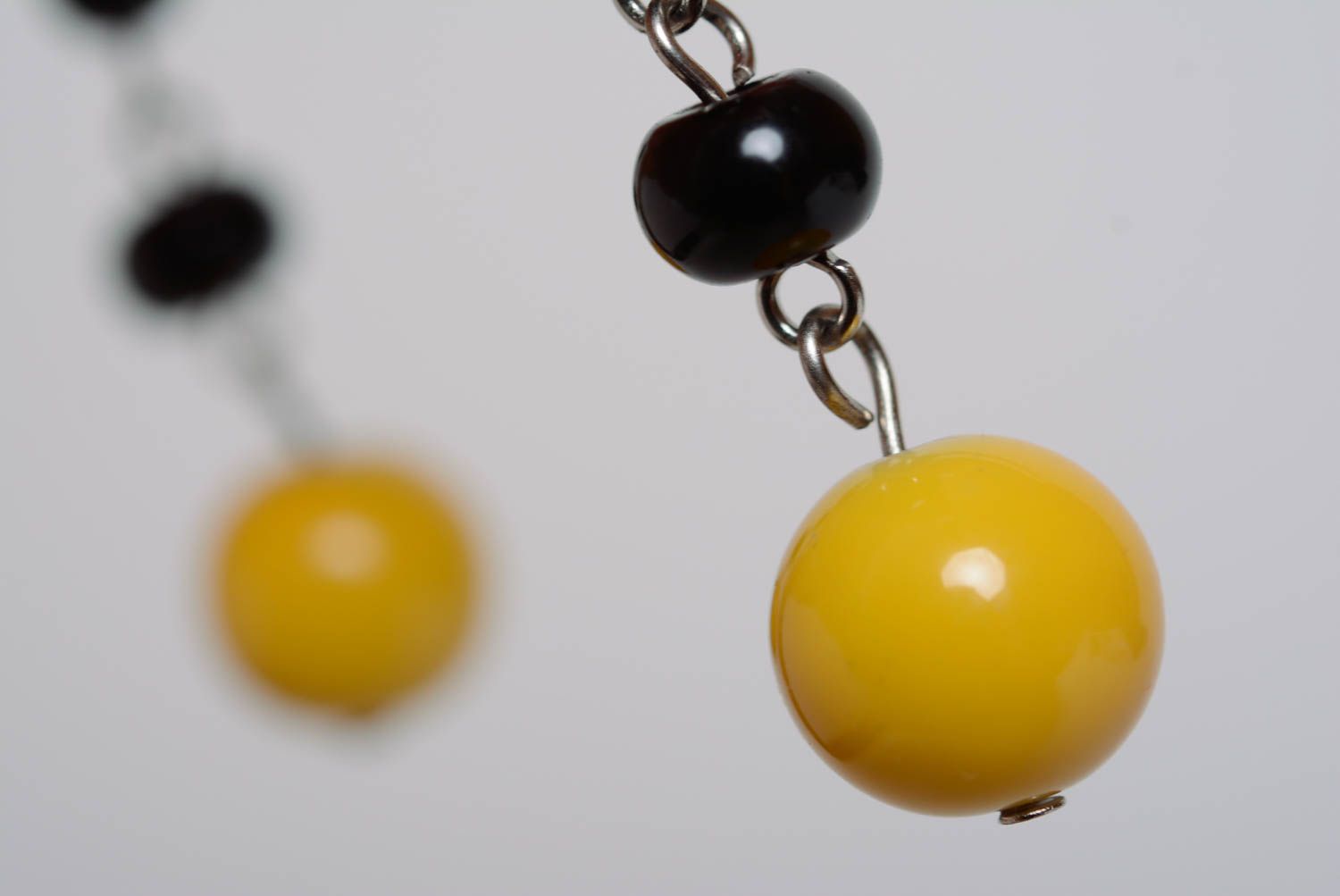 Earrings with plastic beads black and yellow long handmade accessories photo 2