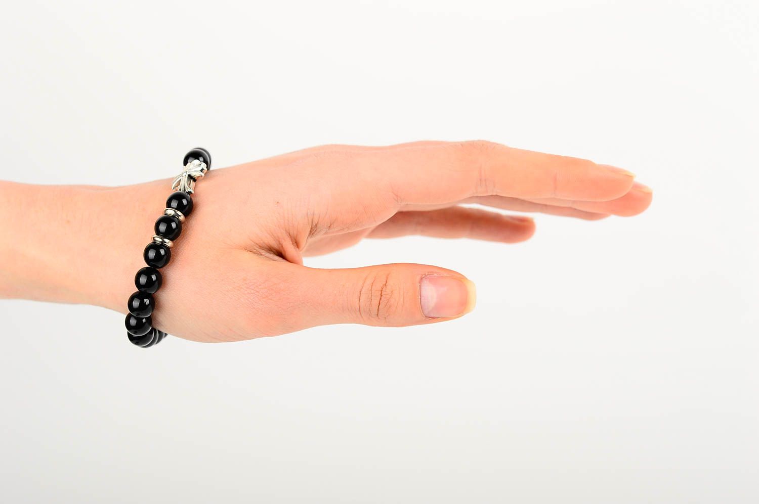 Metal cross and black beads unisex bracelet on an elastic string. Great gift for women photo 2