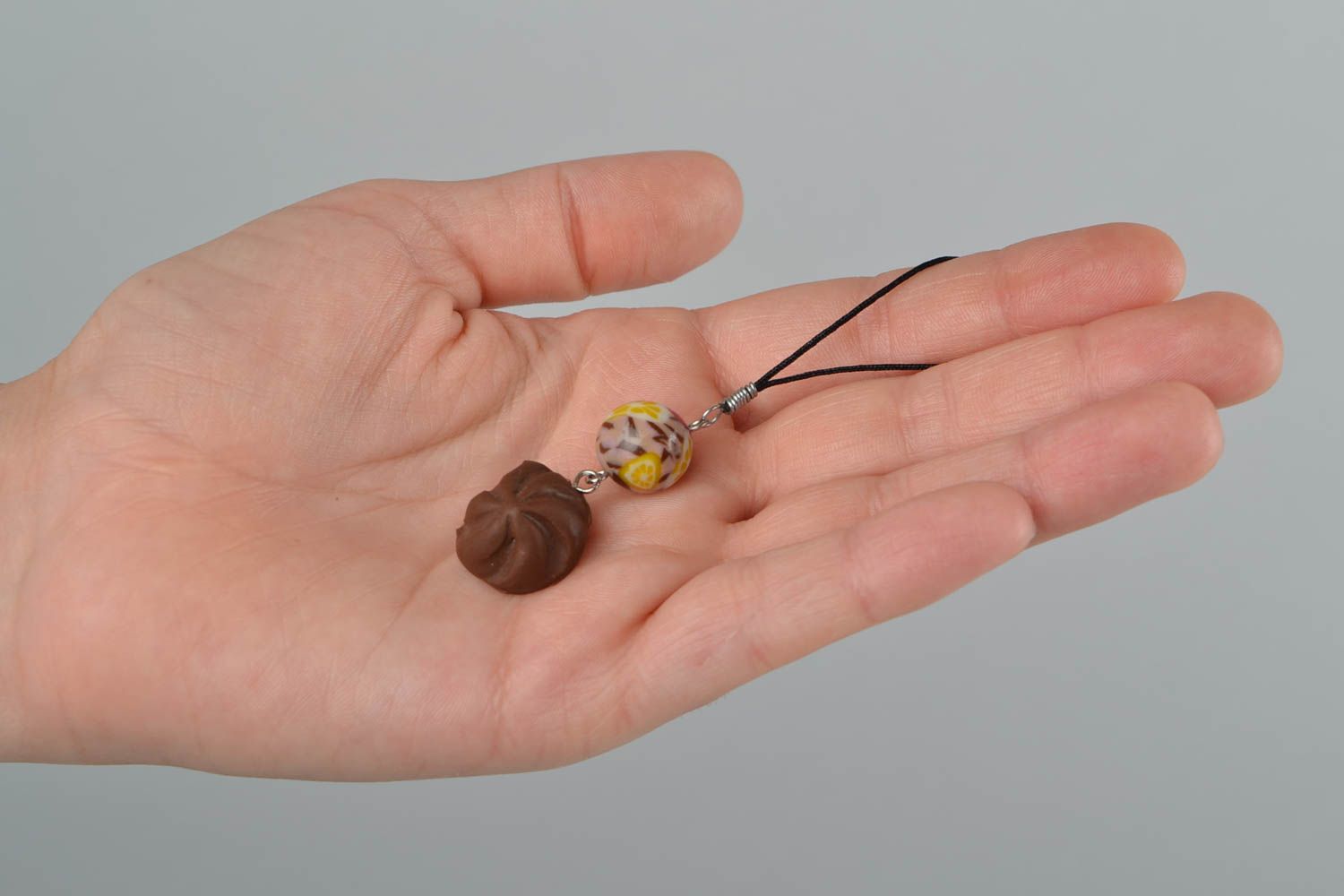 Women's handmade designer polymer clay keychain in the shape of zephyr photo 2