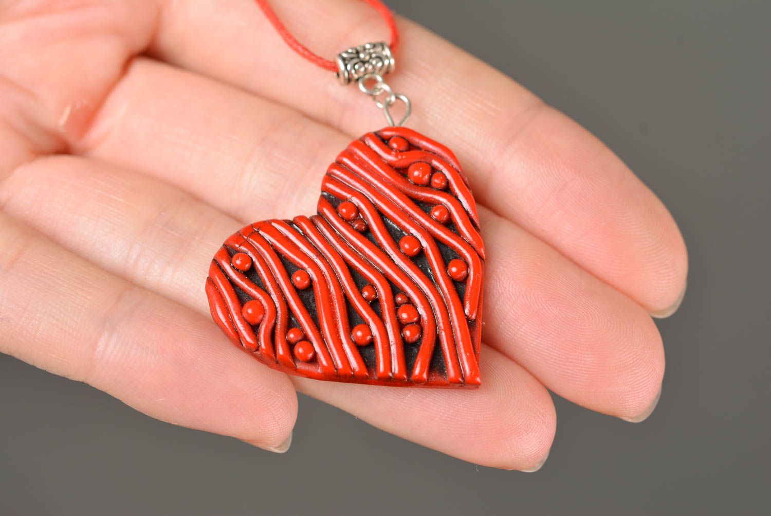 Handmade designer heart shaped polymer clay pendant red and black on cord photo 2
