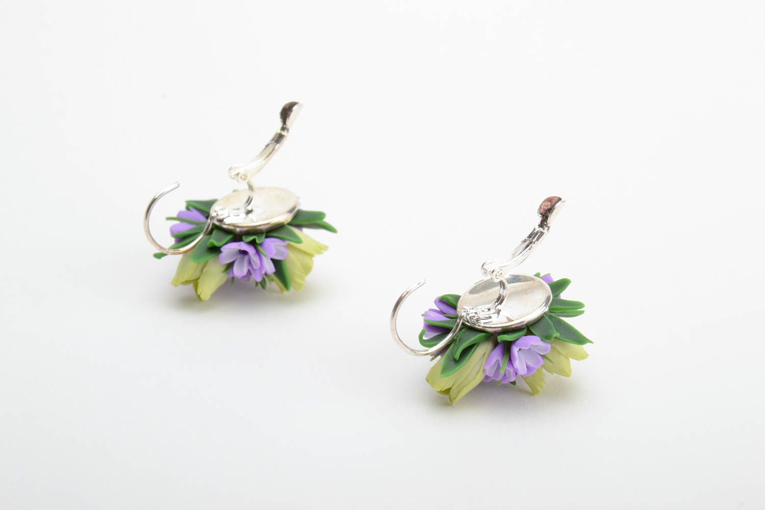 Handmade festive earrings with violet and green polymer clay floral compositions photo 3