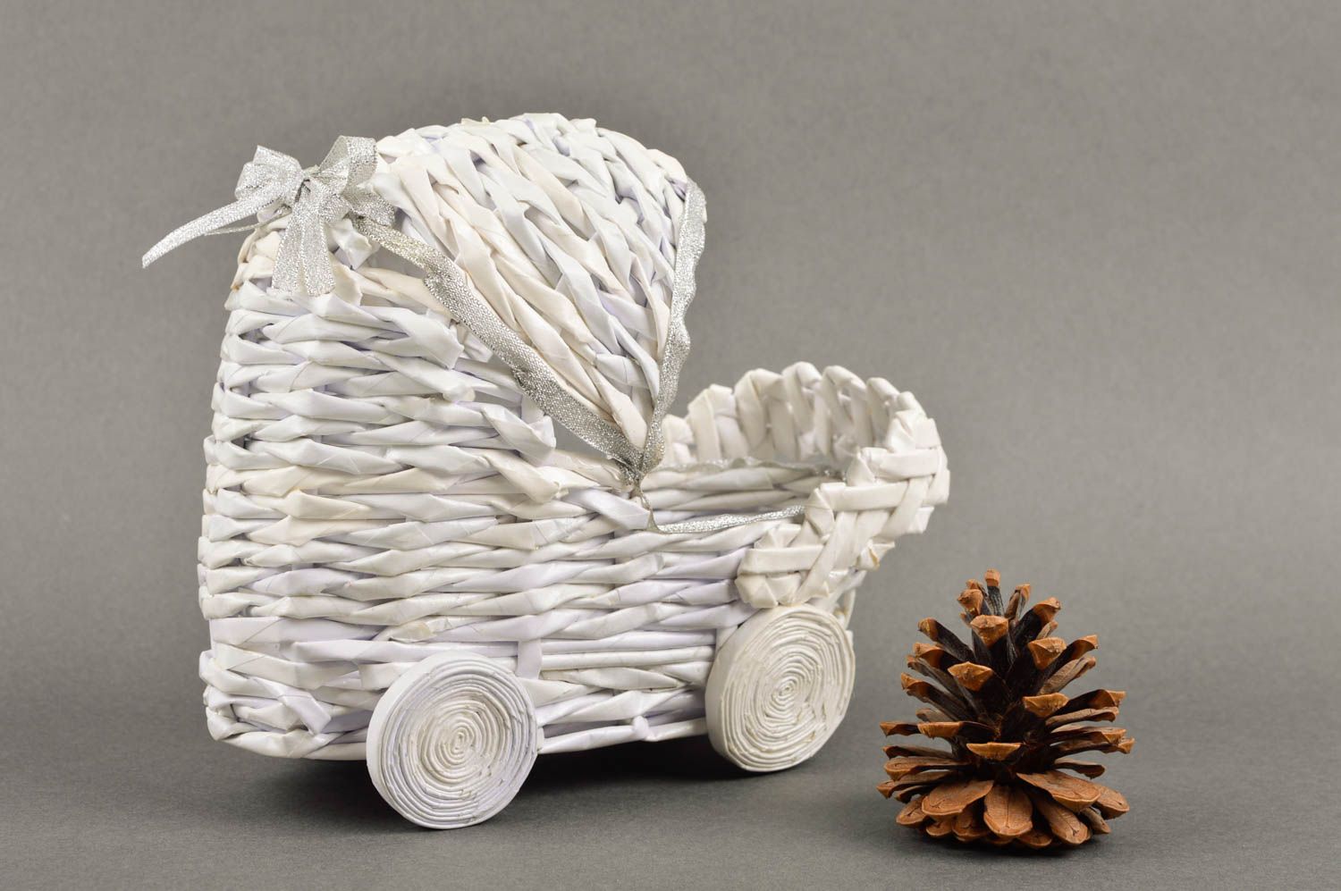 Decorative handmade designer carriage shaped paper basket made of rolled paper photo 1