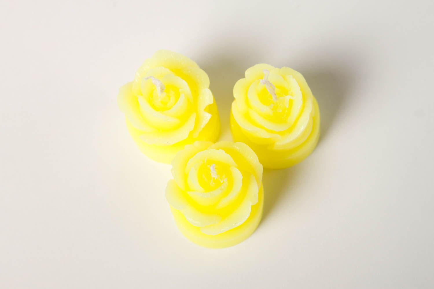 Handmade beautiful candles bright yellow candles 3 cute decor elements photo 4