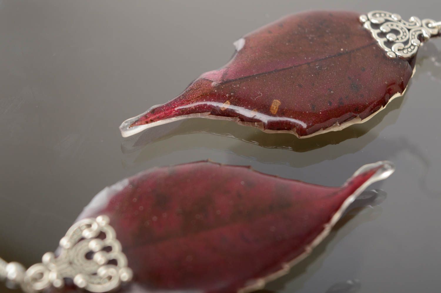 Dangle earrings with real leaves of wild grapes coated with epoxy resin photo 5
