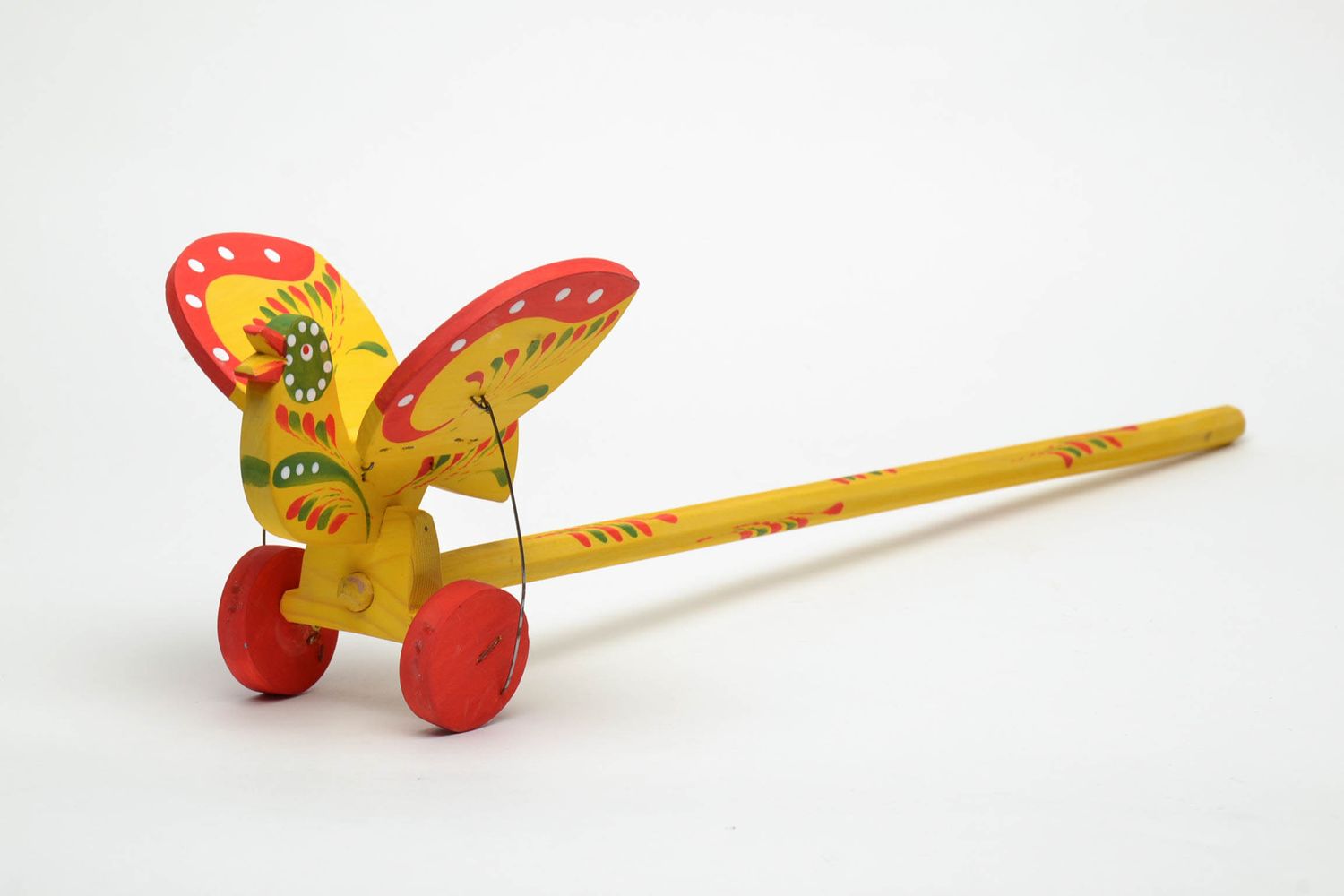 Wooden wheeled toy with Ukrainian ethnic painting Bird photo 2