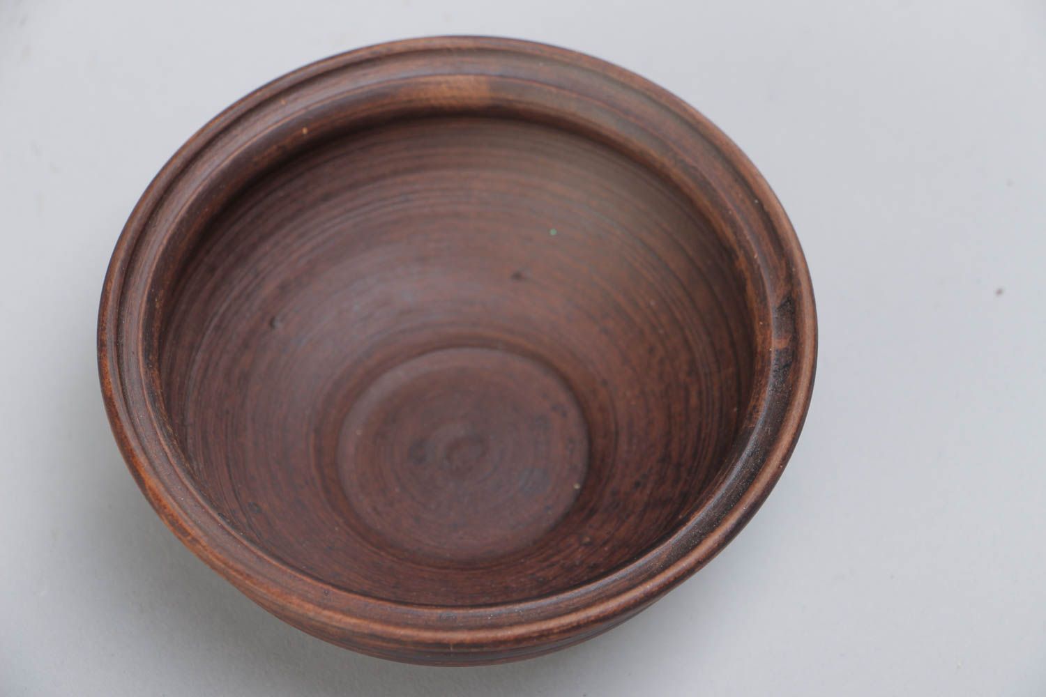 Small dark brown ceramic bowl kilned with the use of milk handmade for 200 ml photo 3