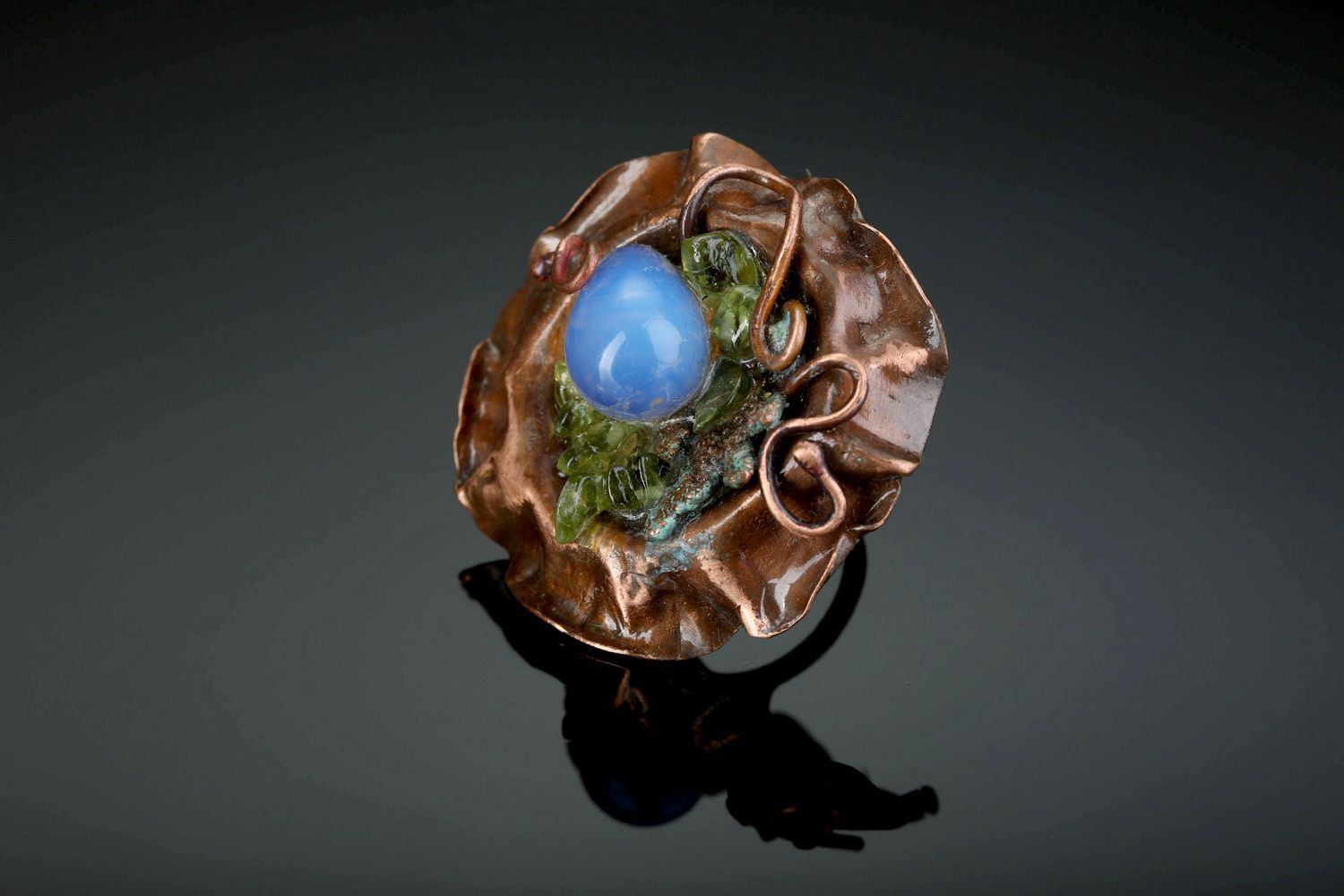 Copper ring with chrysolite photo 1