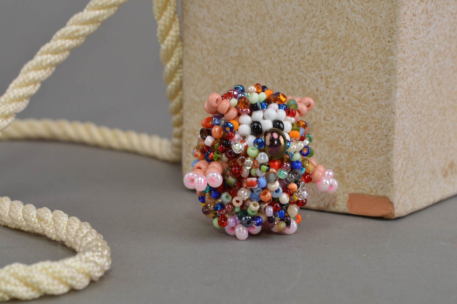 Beautiful colorful handmade designer statuette woven of beads home decor element photo 1