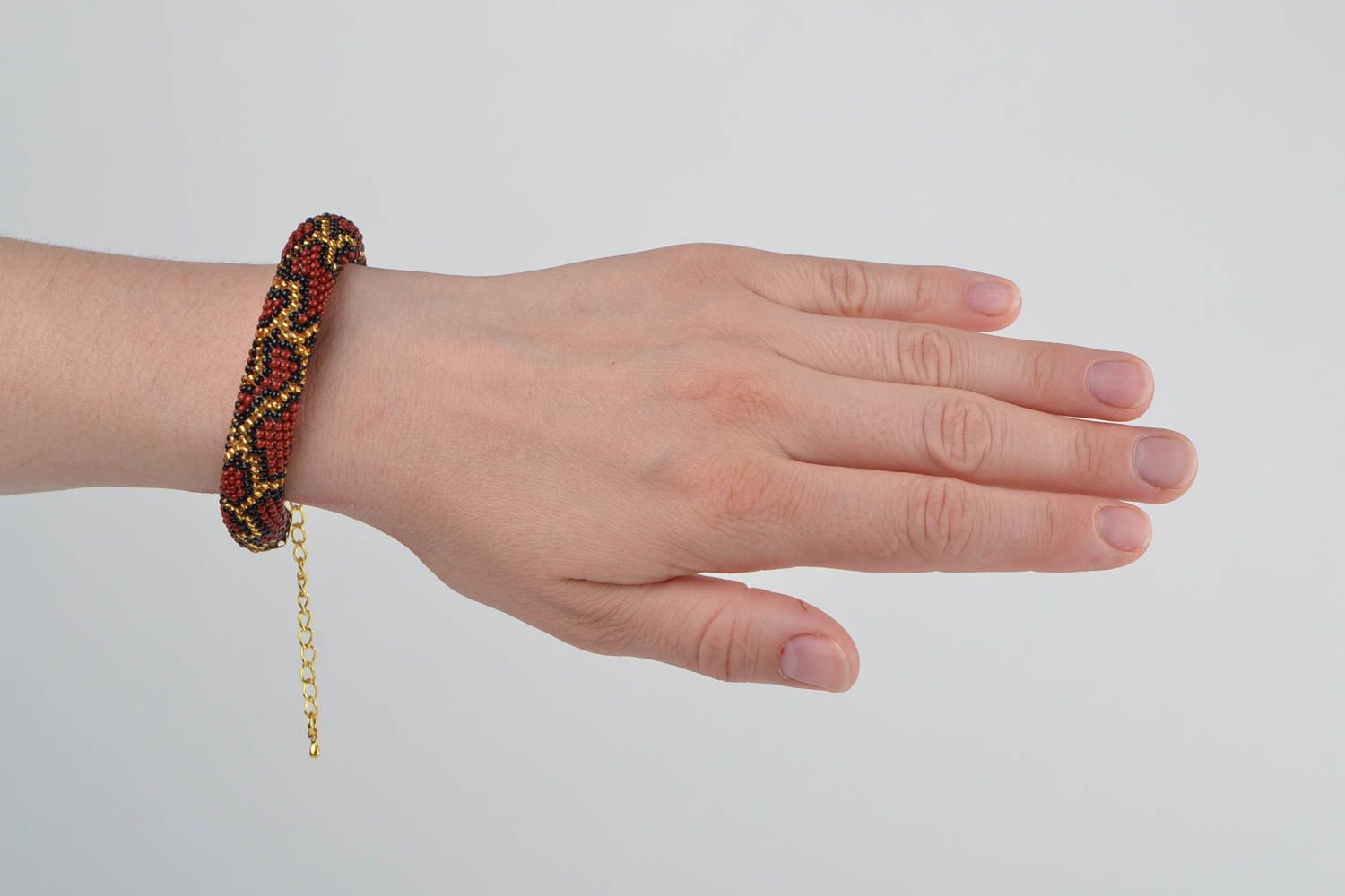 Corded beaded handmade crocheted bracelet with an animal print Python photo 2