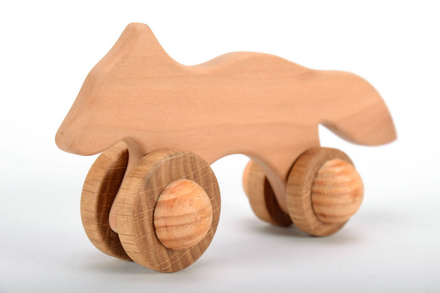 Wooden toy on wheels Fox photo 2