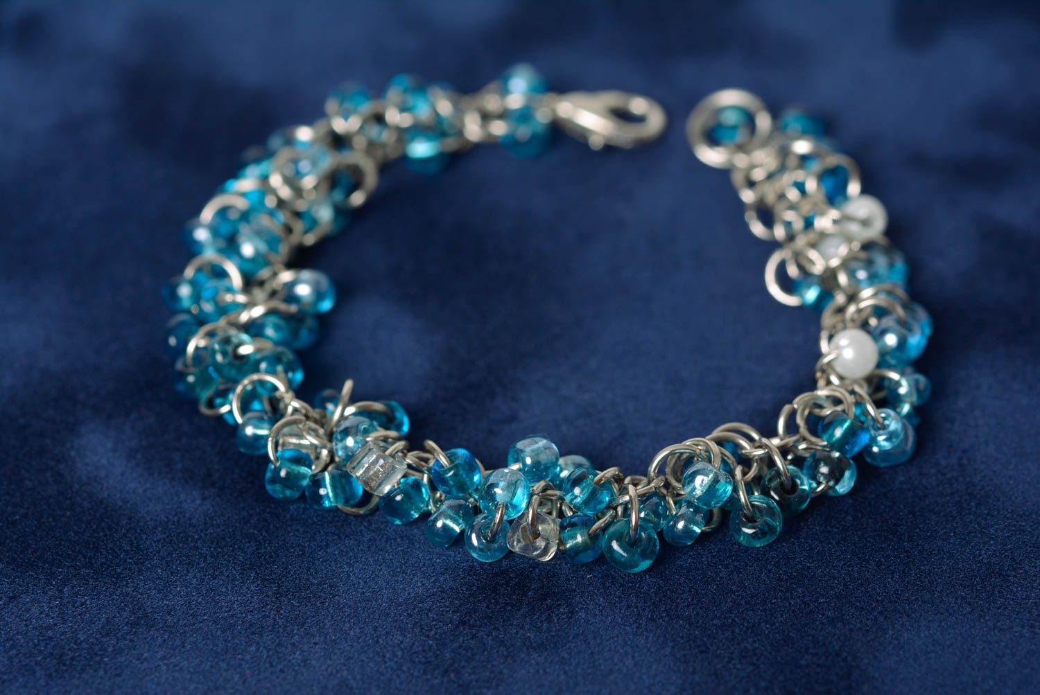 Designer women's wrist bracelet with blue beads and metal handmade stylish photo 1