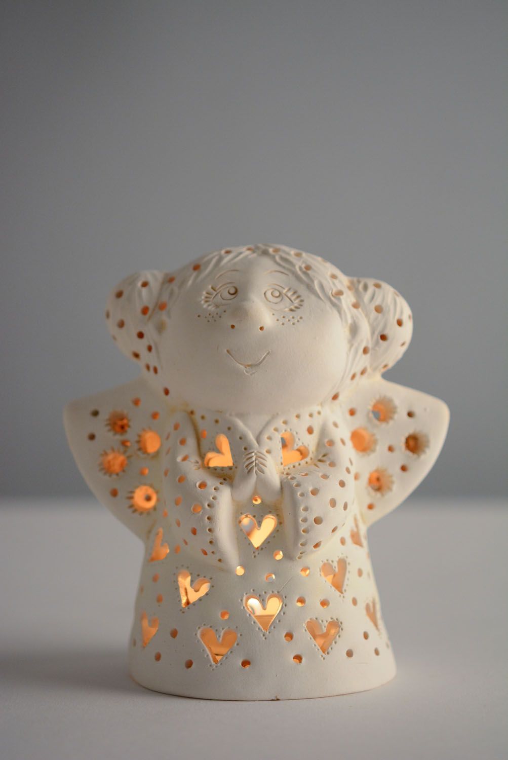 Ceramic candle holder in the shape of angel photo 1