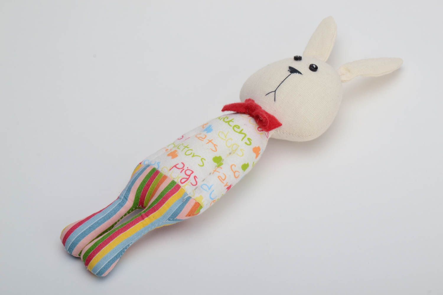 Handmade small cotton fabric soft toy rabbit in striped trousers with red bow tie photo 2