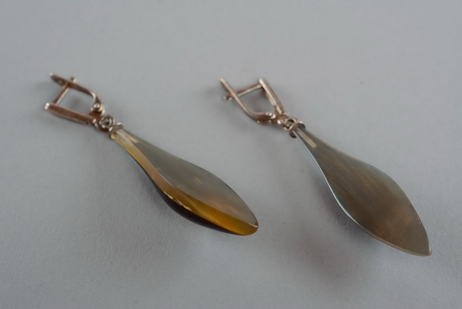 Silver earrings with cow horn photo 5