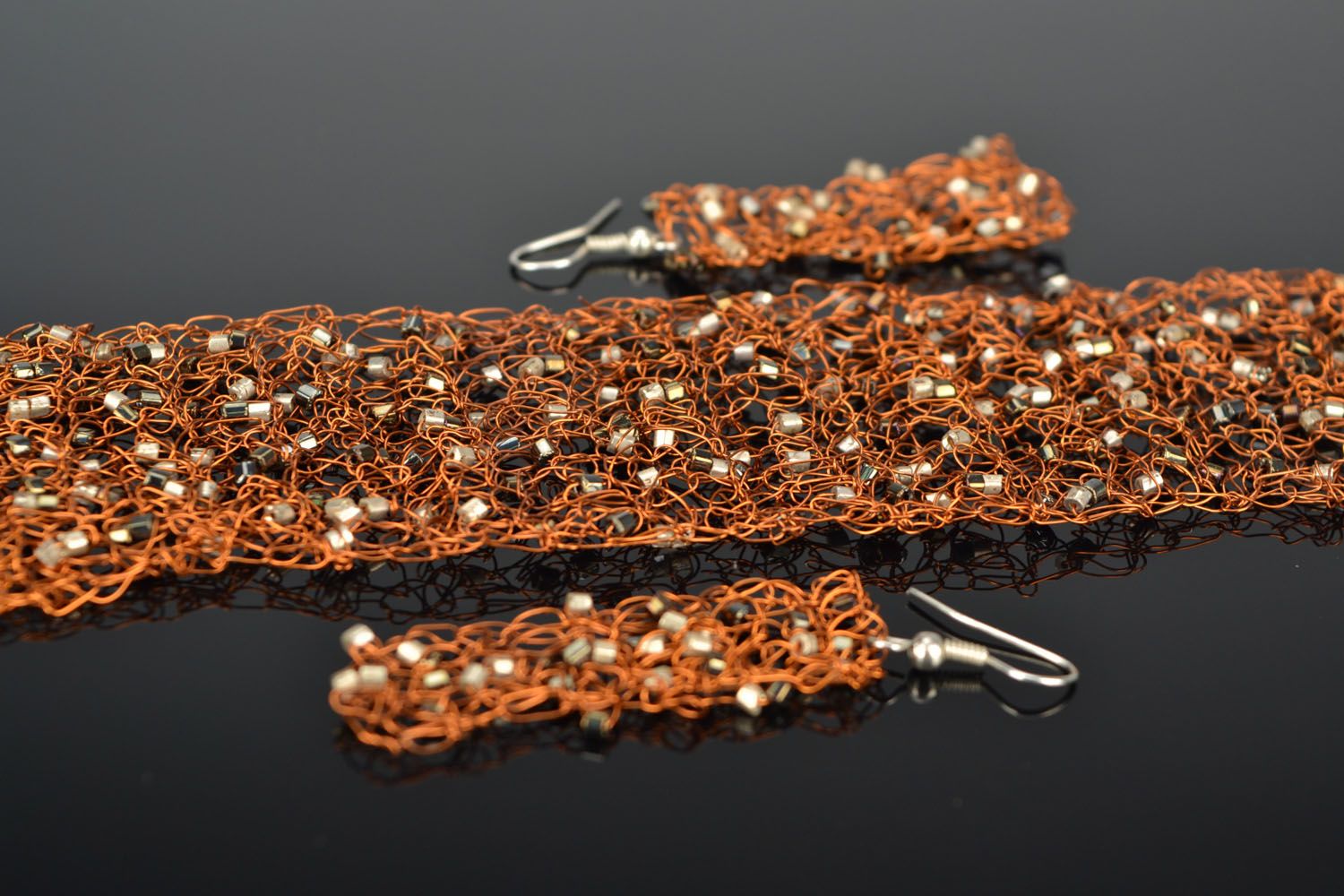 Copper bracelet and earrings with beads photo 1